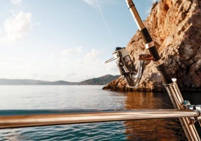 fishing-rod-on-a-sailboat-on-the-background-of-the-2023-11-27-05-12-30-utc