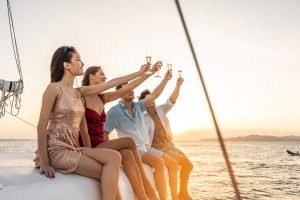 group-of-diverse-friends-drink-champagne-while-hav-2023-11-27-05-15-10-utc