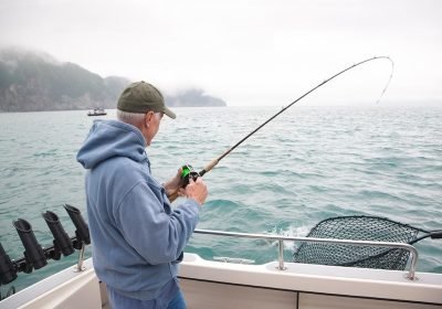 senior-fisherman-in-alaska-catches-silver-salmon-2023-11-27-05-36-45-utc